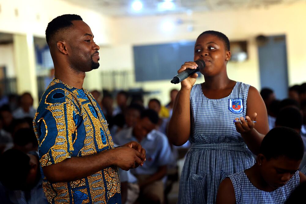 A KETASCO student speaking at the microphone during a Y2L session