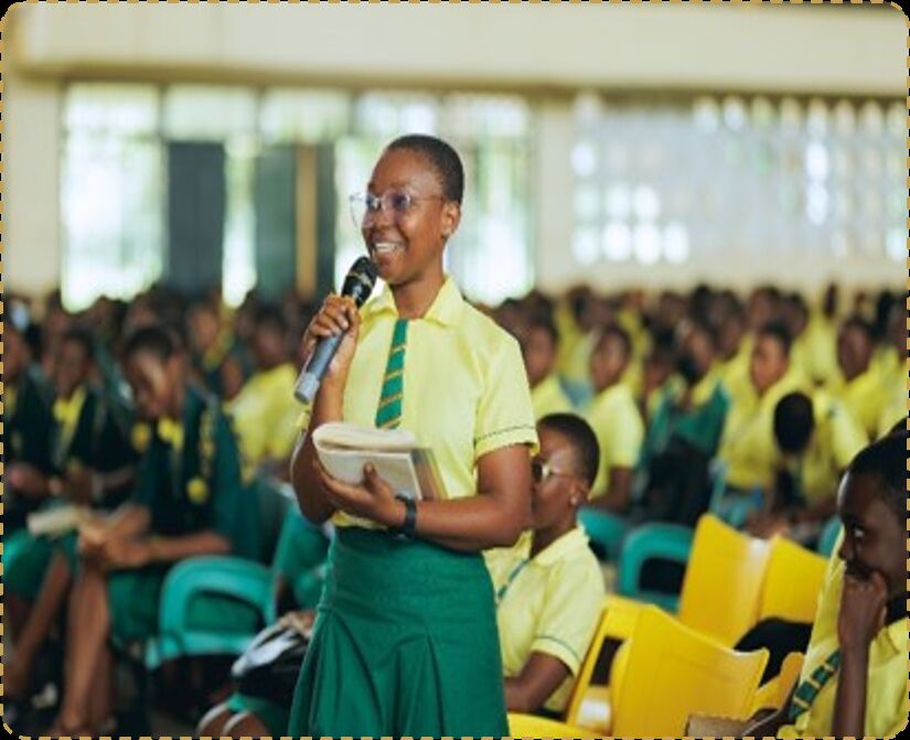 A Wesley Girls High School student speaking at the microphone during a Y2L session